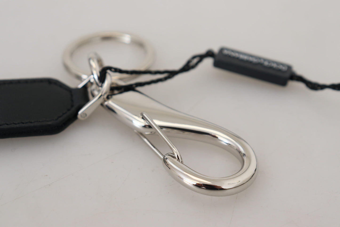 Elegant Black Charm Keychain with Brass Accents