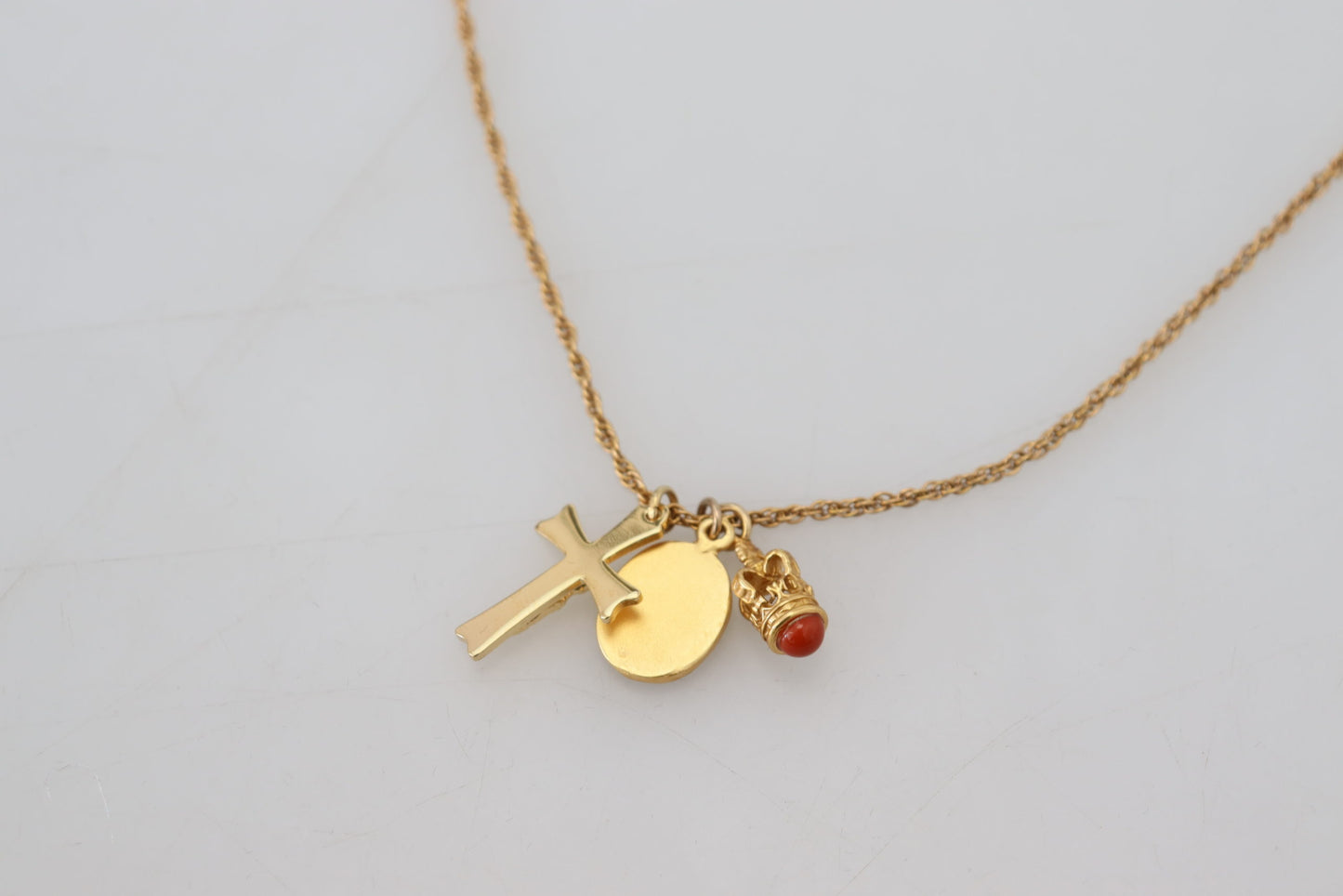 Elegant Gold Tone Charm Necklace with Cross Pendant